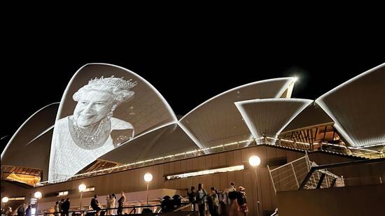 The roof of the Sydney Opera House lit up in honour of the late Queen Elizabeth