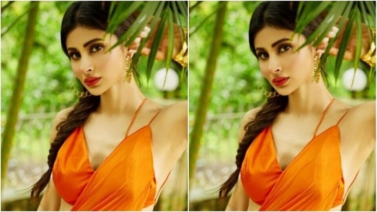 Styled by fashion stylist Rishika Devnani, Mouni wore her tresses into a braid with a middle part as she looked every bit stunning.(Instagram/@imouniroy)