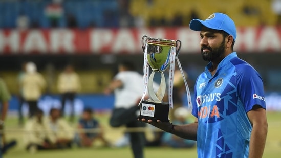 Indian captain Rohit Sharma holds the after winning the T20 cricket series against South Africa, at the Holkar Stadium in Indore.(PTI)