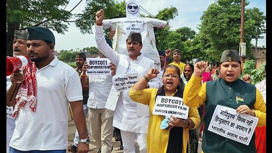 Bharatiya Awam Party supporters raise slogans while holding placards during a demonstration to boycott upcoming movie ‘Adipurush’ alleging inauthentic depictions of important characters like Lord Ram, Ravan and Lord Hanuman among others, in Varanasi on Thursday. (ANI Photo) Bharatiya Awam Party supporters raise slogans while holding placards during a demonstration to boycott upcoming movie ‘Adipurush’ alleging inauthentic depictions of important characters like Lord Ram, Ravan and Lord Hanuman among others, in Varanasi on Thursday. (ANI Photo)