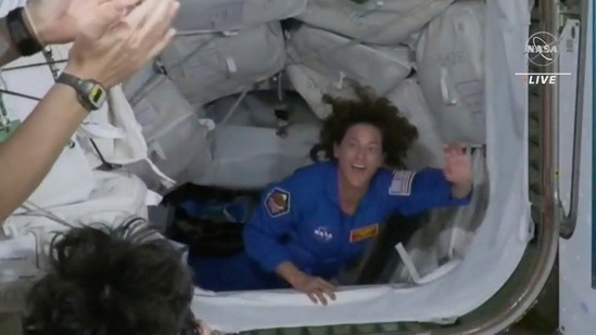 In this image from video made available by NASA, U.S. Marine Col. Nicole Mann, a member of the Wailacki of the Round Valley Indian Tribes in California, and the first Native American woman to orbit the Earth enters the International Space Station on Thursday.&nbsp;(AP)