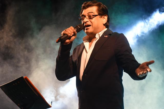 Amit Kumar performing on stage Amit Kumar performing on stage