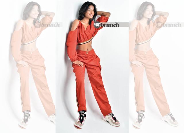 The classic combination of coral orange with blue skies stands out on a range of indian skin tones; Tracksuit by House of Fett; Shoes by Aldo (Raj K Raj) The classic combination of coral orange with blue skies stands out on a range of indian skin tones; Tracksuit by House of Fett; Shoes by Aldo (Raj K Raj)