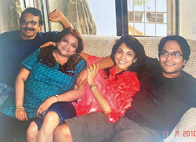 With her brother Anosh (right) and parents With her brother Anosh (right) and parents