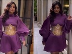 Harnaaz Sandhu poses in a purple mini dress.&nbsp;
