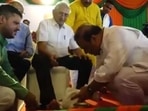 Himanta Biswa Sarma washed the feet of senior BJP leaders on Saturday.