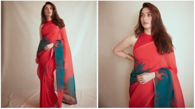Tamannaah Bhatia: Looking for something traditional with a modern touch this Karwa Chauth then you should take style tips from the gorgeous Tamannaah Bhatia. Pick a simple red saree from your mother's closet and style it with a trendy crop top, bralette or bustier top. (Instagram/@tamannaahspeaks) Tamannaah Bhatia: Looking for something traditional with a modern touch this Karwa Chauth then you should take style tips from the gorgeous Tamannaah Bhatia. Pick a simple red saree from your mother's closet and style it with a trendy crop top, bralette or bustier top. (Instagram/@tamannaahspeaks)