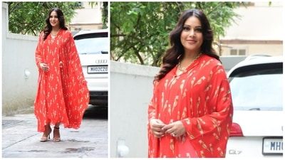 Bipasha Basu was spotted in Bandra on Saturday. The actor is expecting her first child with husband Karan Singh Grover and was seen in a bright red kaftan and heels. (Varinder Chawla) Bipasha Basu was spotted in Bandra on Saturday. The actor is expecting her first child with husband Karan Singh Grover and was seen in a bright red kaftan and heels. (Varinder Chawla)