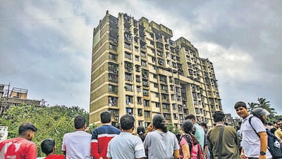Mumbai, India - October 08, 2022: Around 33 people were safely rescued by firefighters after a Level-2 fire broke out on the 12th floor of a residential building Rail View Housing Society around 2:45 pm in the afternoon in the New Tilak Nagar area, near Lokmanya Tilak Terminus station, Chembur, in Mumbai, India, on Saturday, October 08, 2022. (Photo by Satish Bate/Hindustan Times) (Satish Bate/HT PHOTO) Mumbai, India - October 08, 2022: Around 33 people were safely rescued by firefighters after a Level-2 fire broke out on the 12th floor of a residential building Rail View Housing Society around 2:45 pm in the afternoon in the New Tilak Nagar area, near Lokmanya Tilak Terminus station, Chembur, in Mumbai, India, on Saturday, October 08, 2022. (Photo by Satish Bate/Hindustan Times) (Satish Bate/HT PHOTO)