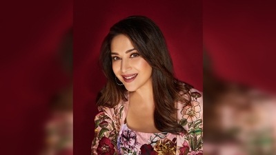 Madhuri Dixit's set comes with a crop top, high-rise flowy pants and a matching cape. (Instagram/@stylebyami) Madhuri Dixit's set comes with a crop top, high-rise flowy pants and a matching cape. (Instagram/@stylebyami)