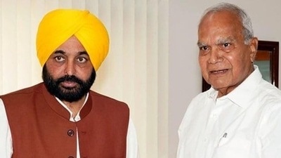 Punjab CM Bhagwant Mann with Governor Banwarilal Purohit. (HT File Photo)