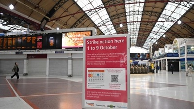 A sign warns passengers of a rail strike at Victoria Station in London. A 24-hour walkout by railway staff in Britain was set to create severe disruption as strikes resumed following the mourning period for Queen Elizabeth II. (AFP) A sign warns passengers of a rail strike at Victoria Station in London. A 24-hour walkout by railway staff in Britain was set to create severe disruption as strikes resumed following the mourning period for Queen Elizabeth II. (AFP)