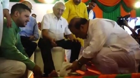Himanta Biswa Sarma washed the feet of senior BJP leaders on Saturday.
