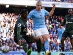Manchester City's Erling Haaland, centre, scores his side's fourth goal at Etihad stadium(AP) Manchester City's Erling Haaland, centre, scores his side's fourth goal at Etihad stadium(AP)
