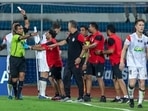 NorthEast United coach and support staffs involve in a heated argument with linesman after a controversial offside decision NorthEast United coach and support staffs involve in a heated argument with linesman after a controversial offside decision