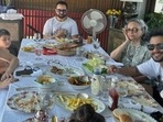 Saif Ali Khan and family bingeing on burgers at his home. Saif Ali Khan and family bingeing on burgers at his home.