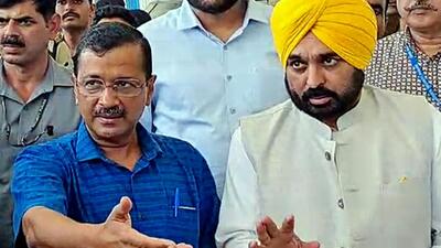 Surat, Oct 09 (ANI): Delhi Chief Minister Arvind Kejriwal with Punjab Chief Minister Bhagwant Mann speaks to the media at Surat airport, on Sunday. (ANI Photo) (ANI) Surat, Oct 09 (ANI): Delhi Chief Minister Arvind Kejriwal with Punjab Chief Minister Bhagwant Mann speaks to the media at Surat airport, on Sunday. (ANI Photo) (ANI)