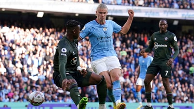 Manchester City's Erling Haaland, centre, scores his side's fourth goal at Etihad stadium (AP) Manchester City's Erling Haaland, centre, scores his side's fourth goal at Etihad stadium (AP)