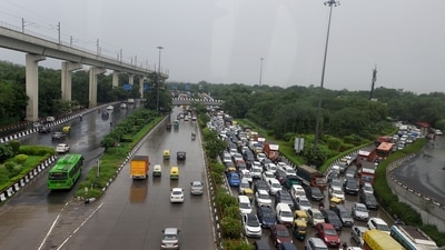 Heavy rain causes traffic snarls in Delhi; check traffic advisory (PTI) Heavy rain causes traffic snarls in Delhi; check traffic advisory (PTI)