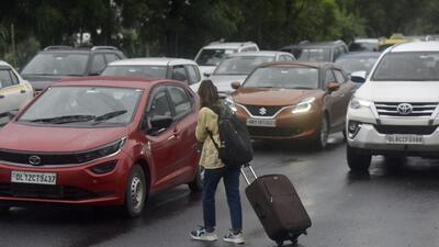 Noida, India- October 09, 2022: A large pothole was created along the Noida-Greater Noida Expressway near Sector 137, leading to a big traffic jam, in Noida, India, on Sunday, October 09, 2022. (Photo by Sunil Ghosh / Hindustan Times) (Hindustan Times) Noida, India- October 09, 2022: A large pothole was created along the Noida-Greater Noida Expressway near Sector 137, leading to a big traffic jam, in Noida, India, on Sunday, October 09, 2022. (Photo by Sunil Ghosh / Hindustan Times) (Hindustan Times)