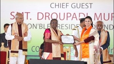 President Droupadi Murmu conferring a degree to a student at the convocation ceremony of Punjab Engineering College on Sunday. (Keshav Singh/HT)