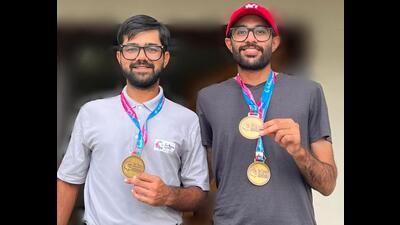 Anant S Ahlawat and (right) Karandeep Kochhar, who bagged the gold medal for Chandigarh at the team golf event of the National Games 2022 at Kensville Golf Resort in Ahmedabad. (HT Photo)