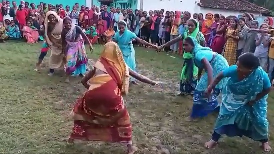 The image, taken from the video posted on Twitter, shows women playing Kabaddi in saree during the Chhattisgarhiya Olympics 2022-23. (Twitter/@AwanishSharan)