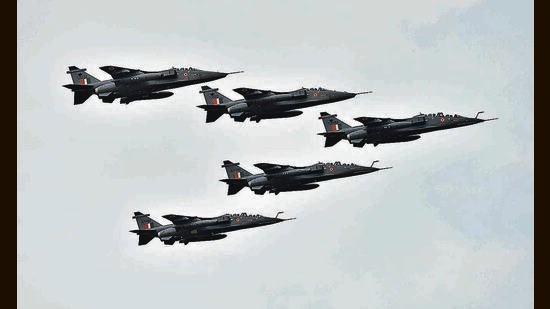 IAF’s Jaguar fighter jets performing during an air show organised to mark the 90th Indian Air ForceDay at Sukhna Lake in Chandigarh on Saturday. (Keshav Singh/HT)