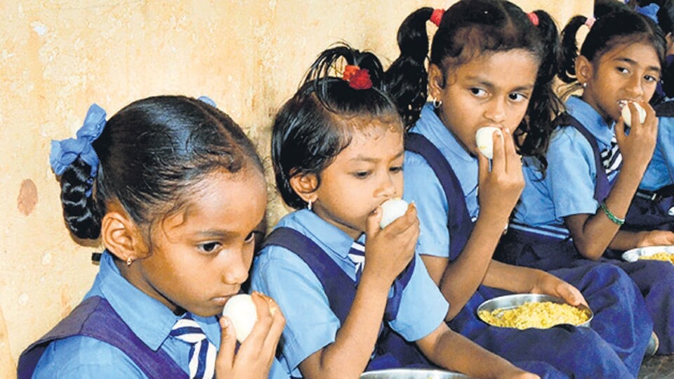 Under the PM POSHAN scheme, the cost of cooking gets the largest allocation among all components, including the prices of ingredients such as cereals, pulses, vegetables, cooking oil and other condiments. (PTI Photo) Under the PM POSHAN scheme, the cost of cooking gets the largest allocation among all components, including the prices of ingredients such as cereals, pulses, vegetables, cooking oil and other condiments. (PTI Photo)