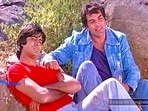 Dharmendra with Amitabh Bachchan from Sholay. Dharmendra with Amitabh Bachchan from Sholay. 