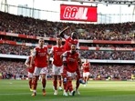 Premier League - Arsenal v Liverpool - Arsenal's Gabriel Martinelli celebrates scoring their first goal with Takehiro Tomiyasu, Granit Xhaka, William Saliba and Bukayo Saka