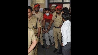 Jaggu Bhagwanpuria produced in the court by Ludhiana police on Monday. (HT Photo)