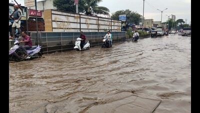 Waterlogging at Upper Indira Nagar road on Monday. (Rahul Raut/HT PHOTO)