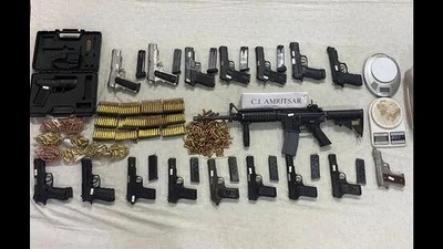 Some of the arms and ammunition recovered by Punjab Police. (HT File) Some of the arms and ammunition recovered by Punjab Police. (HT File)