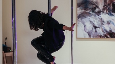 A Saudi woman exercises by pole dancing at a local gymnasium in the capital Riyadh. (AFP) A Saudi woman exercises by pole dancing at a local gymnasium in the capital Riyadh. (AFP)