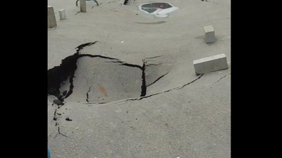 That road that has caved in at Bengaluru's Kundanhalli underpass. (Twitter) That road that has caved in at Bengaluru's Kundanhalli underpass. (Twitter)