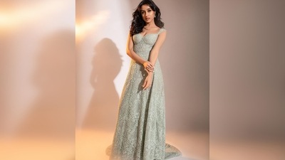 Shraddha Kapoor redefines elegance and grace in these pictures in an ivory shimmery gown by designer Kresha. (Instagram/@shraddhakapoor) Shraddha Kapoor redefines elegance and grace in these pictures in an ivory shimmery gown by designer Kresha. (Instagram/@shraddhakapoor)