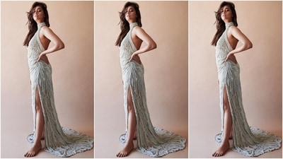 On October 9, Keerthy Suresh dropped photos from a latest shoot and captioned it with a white heart emoticon. The star slipped into a structured, quirky and sultry off-white ensemble from the shelves of the clothing label Abhishek Sharma Studio. (Instagram) On October 9, Keerthy Suresh dropped photos from a latest shoot and captioned it with a white heart emoticon. The star slipped into a structured, quirky and sultry off-white ensemble from the shelves of the clothing label Abhishek Sharma Studio. (Instagram)