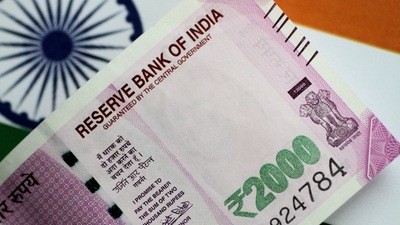 The partially convertible rupee pared all its losses to close unchanged at 82.32 per dollar, pulling back from a record low of 82.6825 hit in early morning trades. (REUTERS)