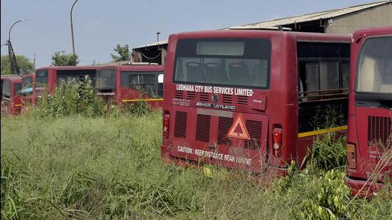 City buses, which will be auctioned, parked at bus depot on Tajpur road in Ludhiana. (HT PHOTO)