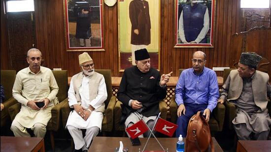 National Conference chief Farooq Abdullah (centre) addresses a condolence meeting for former UP CM Mulayam Singh Yadav at party headquarters, in Srinagar on Monday. (ANI Photo)
