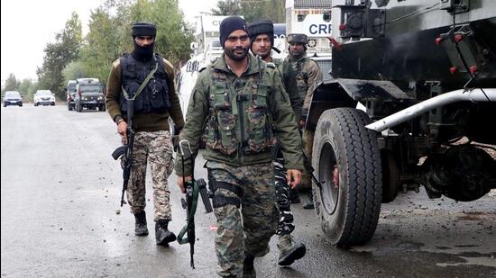 Security personnel in Tangpawa area of Anantnag on Monday. (ANI)