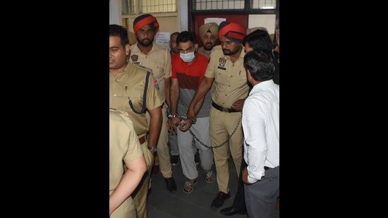 Jaggu Bhagwanpuria produced in the court by Ludhiana police on Monday. (HT Photo)