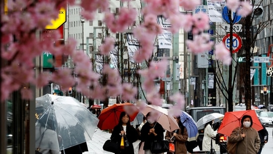 Japan Visa-Free Travel: Pedestrians wearing protective face masks, amid the coronavirus disease in Tokyo, Japan&nbsp;(Reuters)
