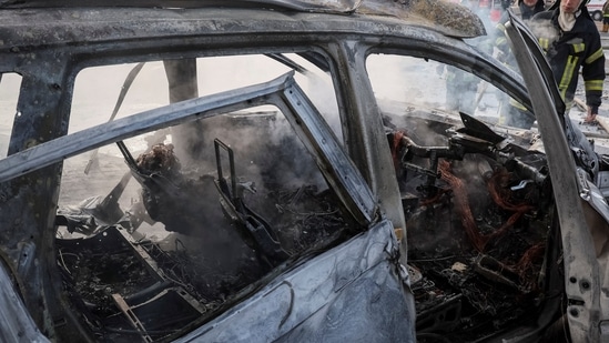 Russia-Ukraine War: A burnt car is seen after a Russian military strike, as Russia's invasion of Ukraine continues, in central Kyiv, Ukraine.(Reuters)