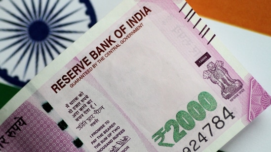 The partially convertible rupee pared all its losses to close unchanged at 82.32 per dollar, pulling back from a record low of 82.6825 hit in early morning trades.(REUTERS)