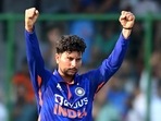 Kuldeep Yadav celebrates after taking the wicket of Anrich Nortje during the third and final ODI between India and South Africa at the Arun Jaitley Stadium in New Delhi(AFP)