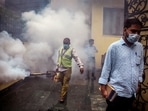 A South Delhi Municipal Corporation (SDMC) worker fumigates an area in Greater Kailash 1 on a rainy day in New Delhi. (Raj K Raj/ HT photo) A South Delhi Municipal Corporation (SDMC) worker fumigates an area in Greater Kailash 1 on a rainy day in New Delhi. (Raj K Raj/ HT photo)