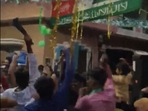 The men were seen dancing with swords and other weapons.(Screengrab of video) The men were seen dancing with swords and other weapons.(Screengrab of video)