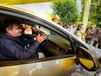 Union Minister for Road Transport & Highways Nitin Gadkari rides a car at the launch of Toyota's first-of-its-kind pilot project on Flexi-Fuel Strong Hybrid Electric Vehicles, in New Delhi. Union Minister for Road Transport & Highways Nitin Gadkari rides a car at the launch of Toyota's first-of-its-kind pilot project on Flexi-Fuel Strong Hybrid Electric Vehicles, in New Delhi.